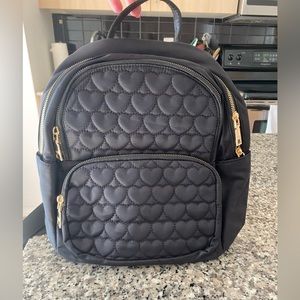 Brand New, Never Used Black Women's backpack with adorable heart pattern